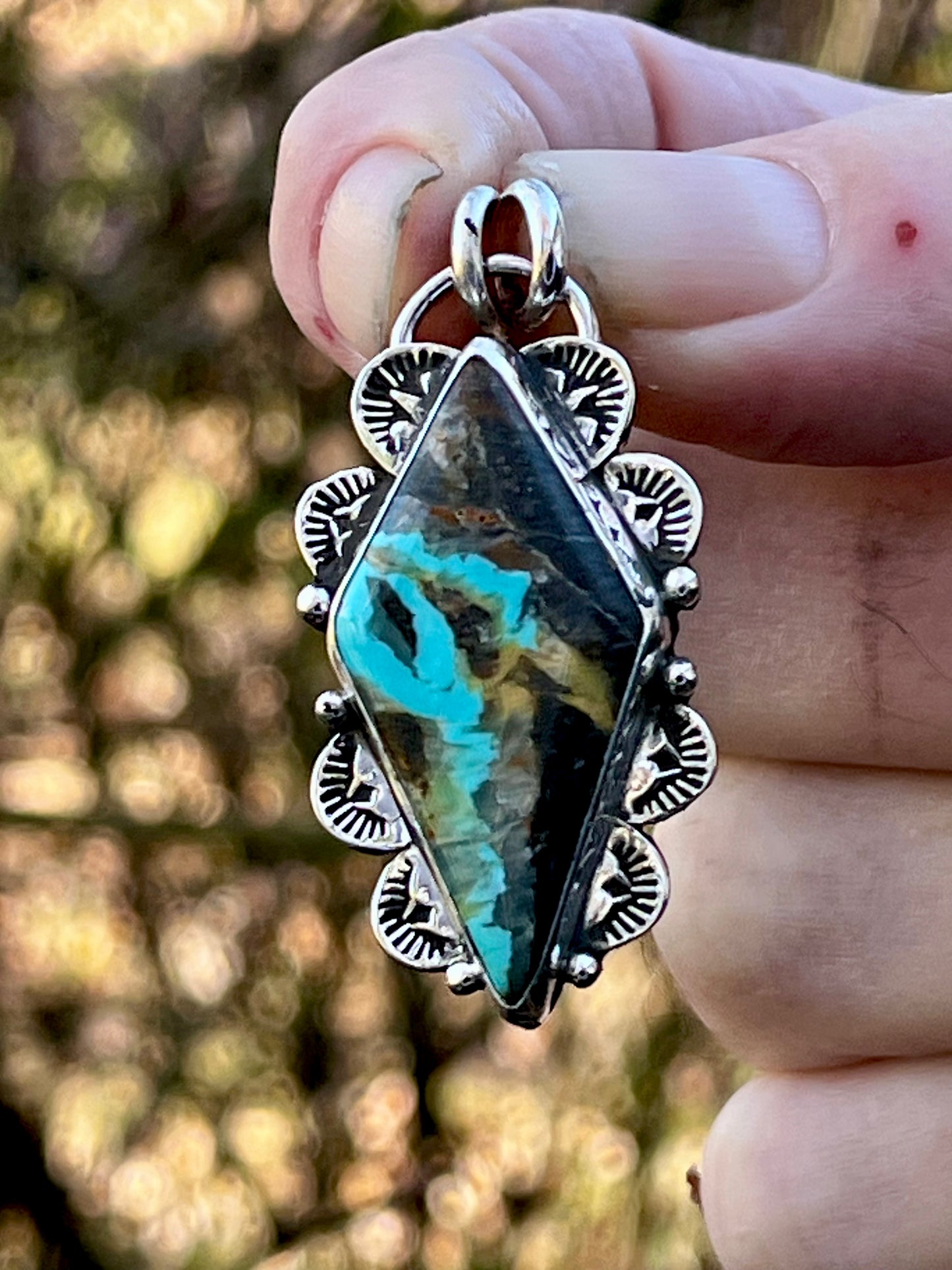 Handcrafted Tyrone Turquoise pendant