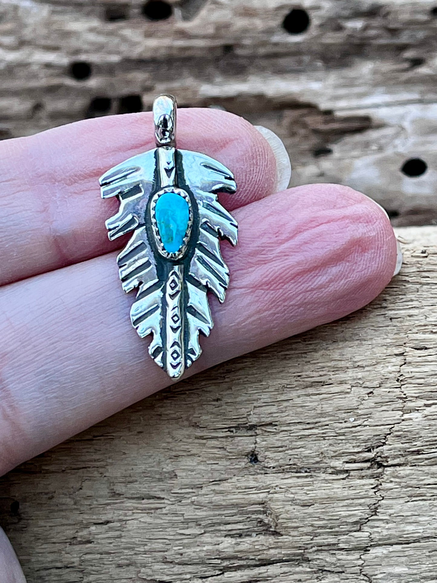 High grade Royston Turquoise “small” feather pendant