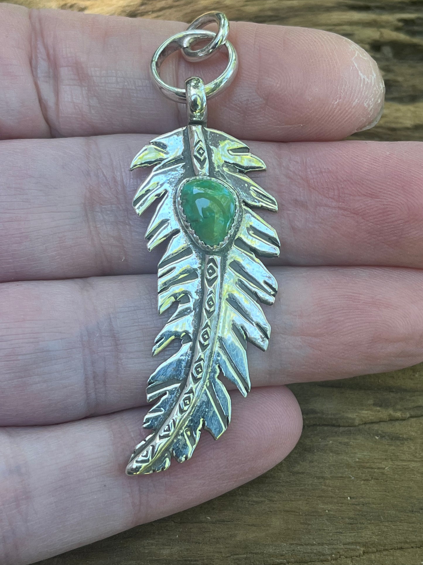 High grade royston turquoise feather pendant