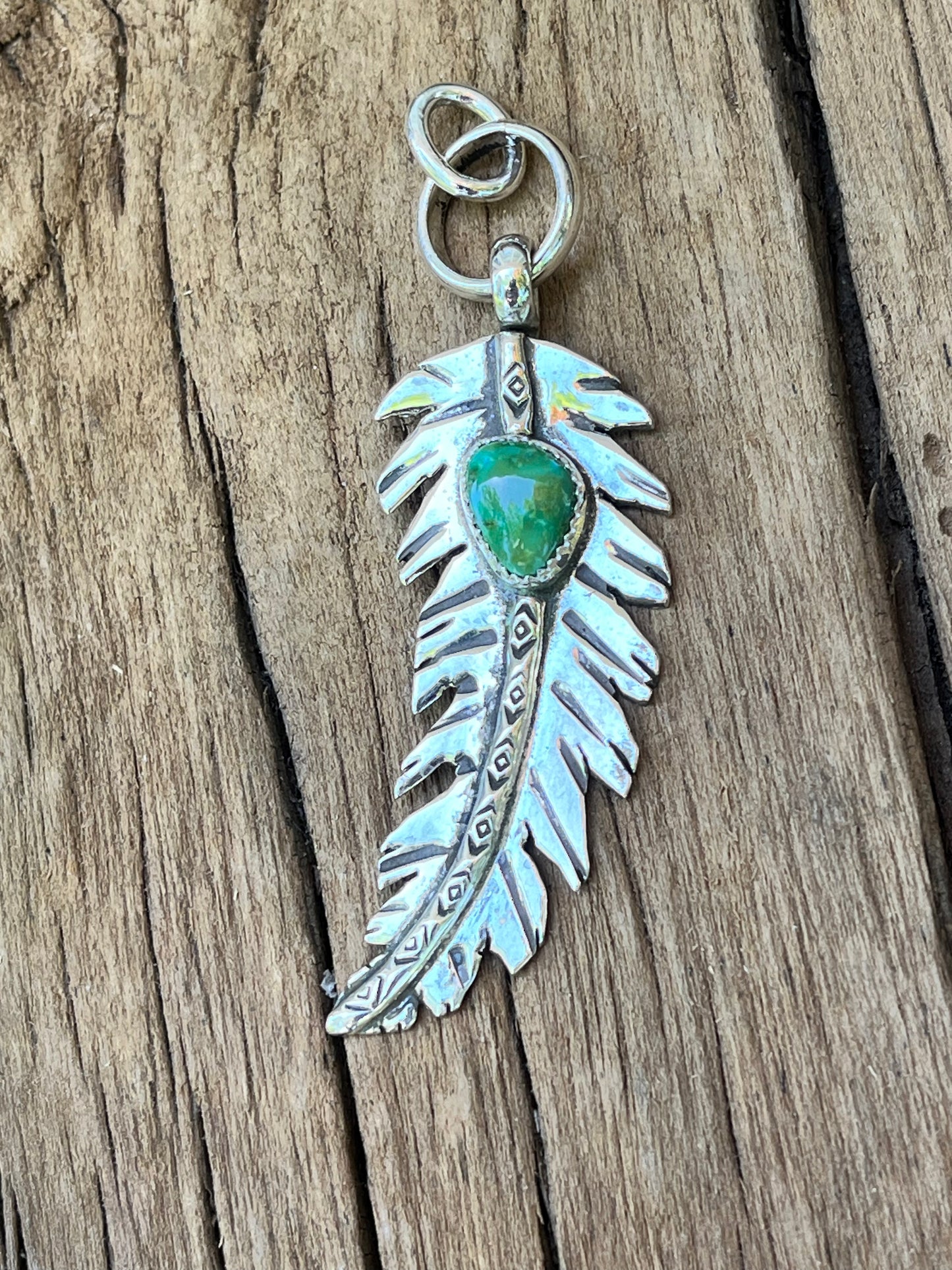 High grade royston turquoise feather pendant